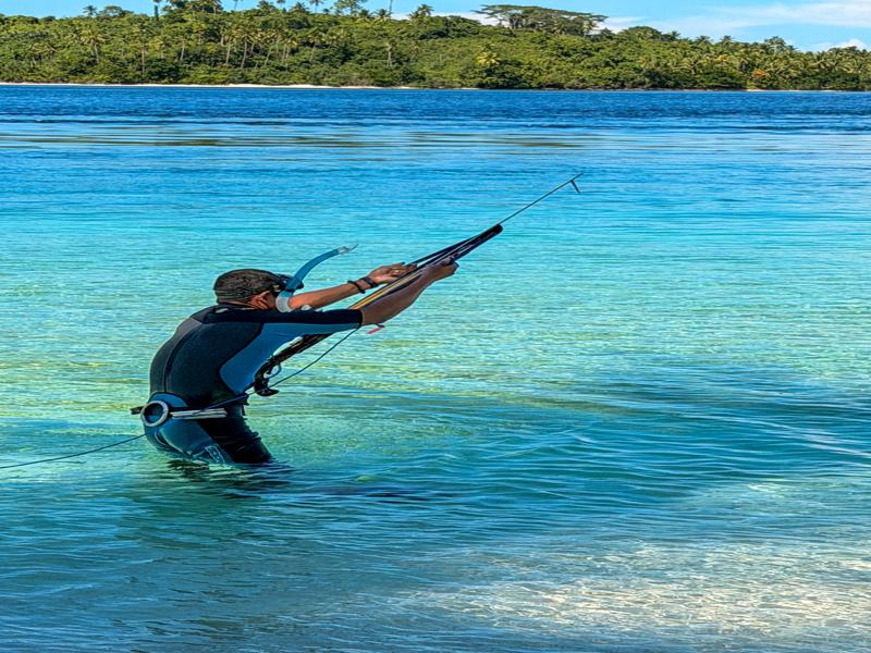 Pirman, from our island family, spear fished every day and joined us on the boat tour