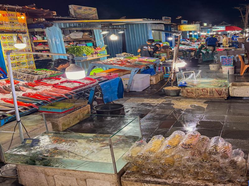 The row of fish market stalls