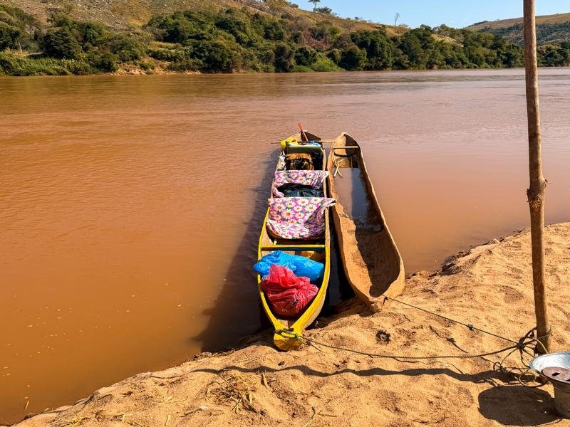 Our canoe next to another dugout canoe