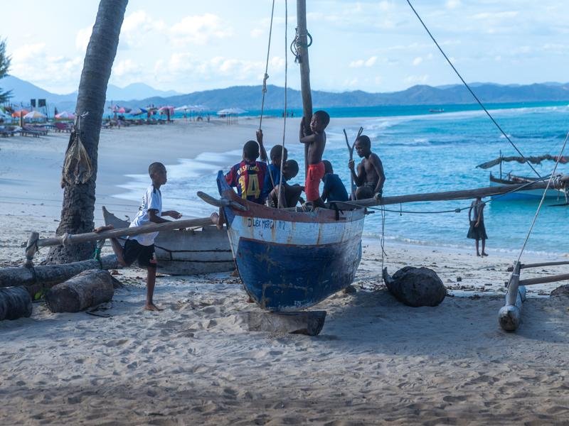 Local kids playing on the boat