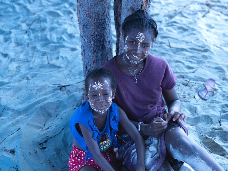 Local girls with traditional face paint