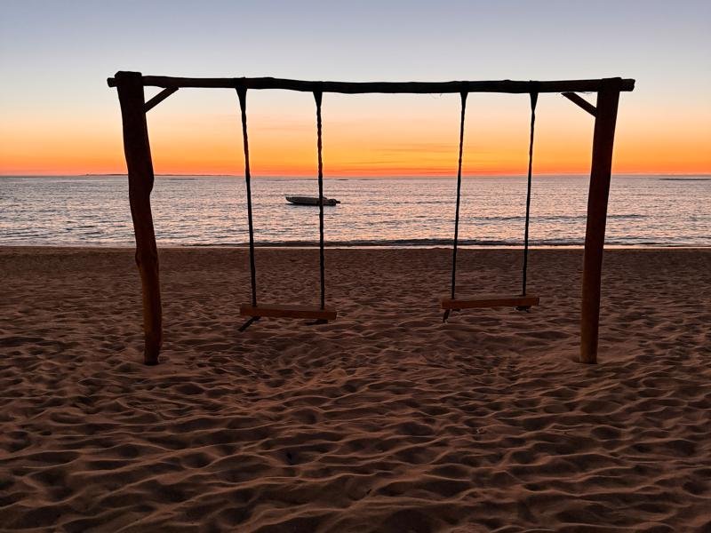 Sunset and swings at our beach