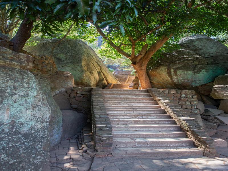 Many stairs take you to the base of the rock