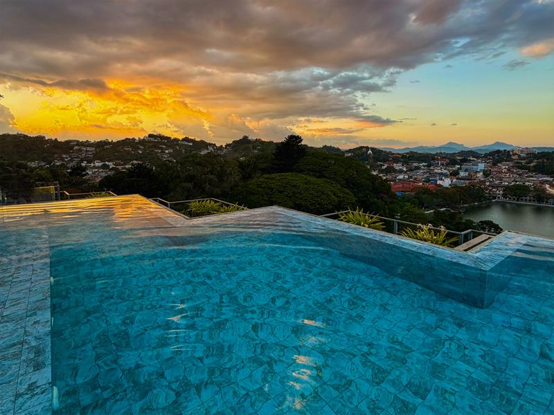 Hotel pool at sunset