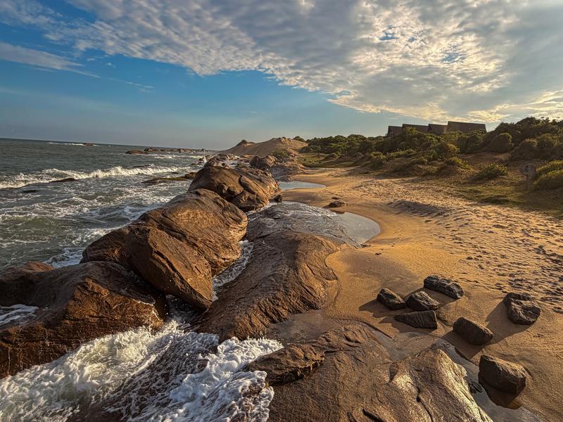The beach was rocky with large dunes